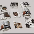 Multiple Opened Interior Design Books And Magazines Showcasing Home Decor Content