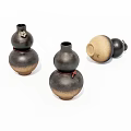 Three Gourd Shaped Ceramic Vases With Brown Black Hues And Red Accents