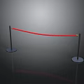 Red Rope Barrier With Black Stanchions And Round Bases On Gray Background