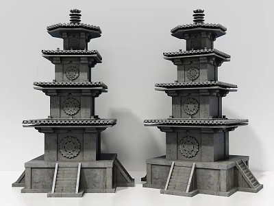 Two Traditional Multi Tiered Stone Towers With Decorative Patterns And Steps 3d model