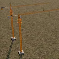 Yellow Tower Cranes With Tall Booms Standing On Green Grassland