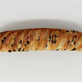 Freshly Baked Long Loaf Bread With Dark Raisins And Golden Crust