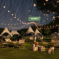 Starry Night Garden Landscape With White Tents String Lights And Lawn Seating Area