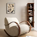 Cream Upholstered Accent Chair With Curved Wooden Arms Decorative Bookshelf And Wall Art