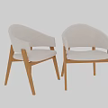 Two Modern Minimalist Dining Chairs with Light Gray Fabric Seats and Wooden Legs