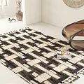 Square Area Rug With Black White Geometric Pattern And Tassel Edges In Modern Living Room