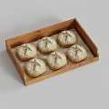 Six Freshly Baked Flour Dusted Bread Rolls in Wooden Serving Tray