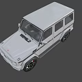 White Mercedes-Benz G-Class SUV With Black Wheels And Front Grille Design
