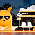 Yellow Cartoon Rabbit Photo Spot With Sunglasses Bus Stop Structure And Bench Seats