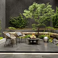 Courtyard Garden Design With Stone Patio Woven Chairs Fire Pit Small Tree And Vine Walls