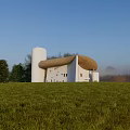 White Building With Straw Roof In Green Meadow And Rural Landscape