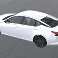 Modern White Sedan With Sleek Design Black Wheels And Front Grille On Urban Road