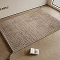 Beige Woven Square Rug On Wooden Floor With Books And Television Display Area