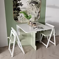 White Dining Table Set With White Chairs Green Plant And Magazine On Light Wooden Floor