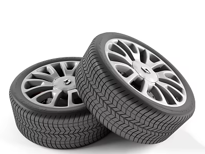 Stacked Car Tires With Silver Alloy Wheels And Detailed Tread Pattern 3d model