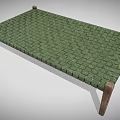 Single Bed With Green Woven Surface And Simple Wooden Legs Design