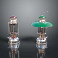 Vintage Kerosene Lamps With Red Top Green Shade And Metallic Structure On Black Reflective Surface