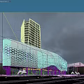 Modern Architectural Building With Perforated Curved Facade And Glass Curtain Wall