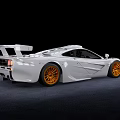 White High Performance Sports Car With Orange Alloy Wheels Sleek Aerodynamic Body And Rear Spoiler