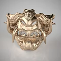 Golden Decorative Mask With Intricate Carvings And Tusk Details
