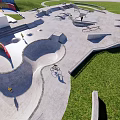 Outdoor Skate Park With Concrete Ramps Biking Area And Green Grass Surroundings