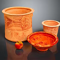 Artisan Orange Patterned Pottery Set With Various Sizes Bowls And Red Apple 3d model