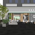 Brunch Cafe Outdoor Seating Area With Umbrellas Tables Chairs And Green Plants
