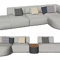 Beige Sectional Sofa With Colorful Cushions And Round Wooden Side Table