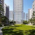 Modern High Rise Residential Building With Green Lawn Trees And Pathway