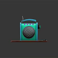 Blue Portable Radio Style Speaker with Antenna Pink Buttons and Cartoon Pattern on Red Mat