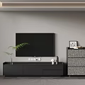 Modern TV Stand With Matching Drawer Cabinet TV Green Plant And Decorative Items In Living Room