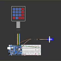 Microcontroller Development Board With Keypad LED Lights And Connecting Wires