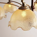 Vintage Glass Chandelier with Scalloped White Shades and Brown Metal Frame Hanging in Light Room