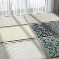 Textured Square Rugs In Various Colors And Patterns On Bright Floor With Natural Light
