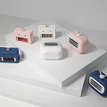 Colorful Cube Shaped Mini Speakers Pink White Blue On White Step Platform Light Grey Background