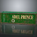Rusty Green Container With ADEL PRINCE Lettering FRAPDLE And Lifebuoy Symbol