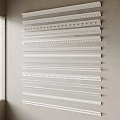 Various Decorative Gypsum Cornice Designs Displayed On Wall For Interior Decoration