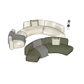 Modern Curved Light Colored Sectional Sofa Upholstered With Throw Pillows And Blanket