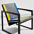 Modern Accent Chair With Geometric Pattern Upholstery Yellow Blue Trim And Black Metal Frame