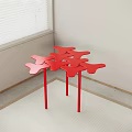 Red Abstract Leaf Shaped Side Table With Slender Legs In Room Corner 3d model