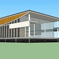 Modern Architectural Structure With Sloped Roof Large Glass Windows And Yellow Panels