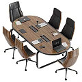 Oval Wooden Office Desk With Laptop Documents Phone And Office Chairs