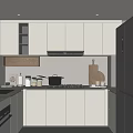 Modern Kitchen Interior With White Cabinets Black Refrigerator And Gas Stove Top
