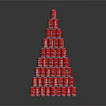 Red Cans Stacked In Pyramid Shape Tower Display On Black Surface