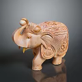 Handcrafted Wooden Elephant Figurine With Intricate Carved Patterns And Details