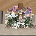 Colorful Floral Installation in Indoor Space with Spring Theme and Hello Spring Sign