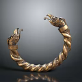 Elegant Golden Twisted Bracelet With Animal Head Decorations And Unique Design