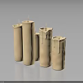 Beige Cylindrical Decorative Candles With Wax Drips On Dark Surface