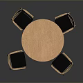Round Wooden Dining Table With Four Chairs And Black Cushions