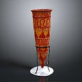 Artistic Vase With Red And Yellow Patterns On Black Stand And White Base